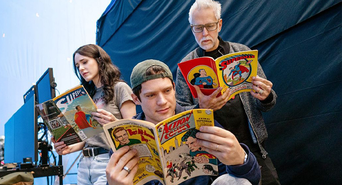 Rachel Brosnahan, David Corenswet, and James Gunn reading Superman comics on the set of Superman (2025)